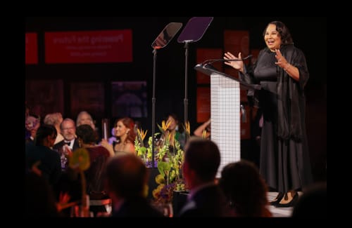 Chevy Humphrey addresses a seated audience