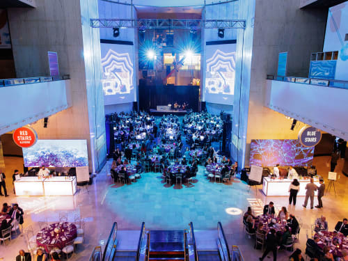 Museum Rotunda during evening event with dinner tables