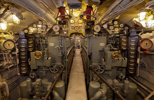 Wide view of the U-505 engine room's valves, dials and controls