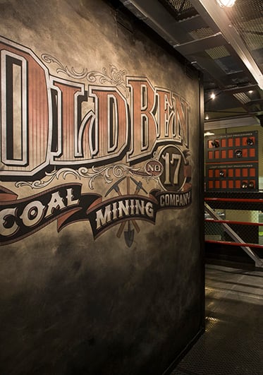Exhibit entry sign saying "Old Ben No. 17 Coal Mining Company" in frontier-style lettering