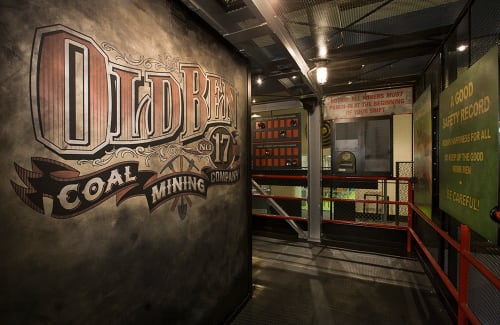 Exhibit entry sign saying "Old Ben No. 17 Coal Mining Company" in frontier-style lettering