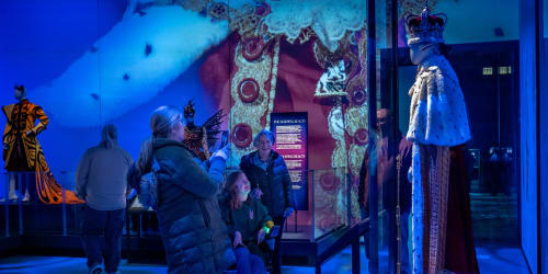 Visitors to the 'Crafting Character: The Costumes of Paul Tazewell' exhibit marvel at King George's costume from the musical 'Hamilton'.