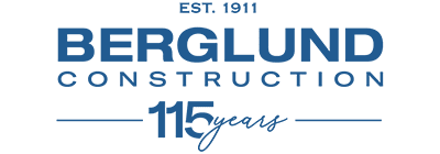 Berglund Construction logo with "Est. 1911" and "115 Years"