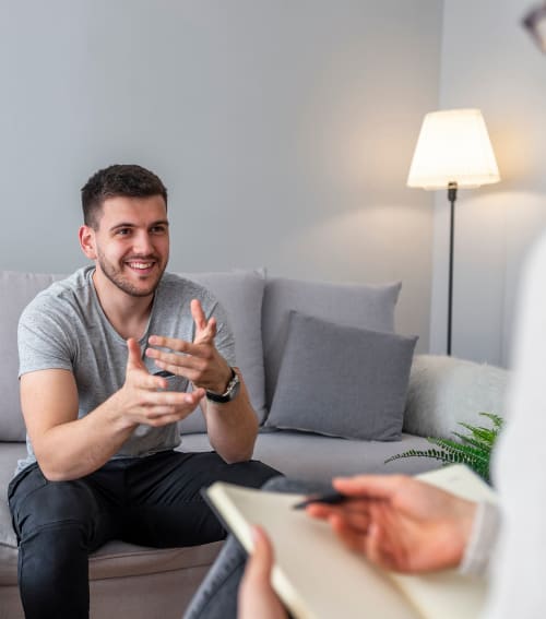 man meeting with a therapist