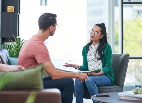 man meeting with a therapist