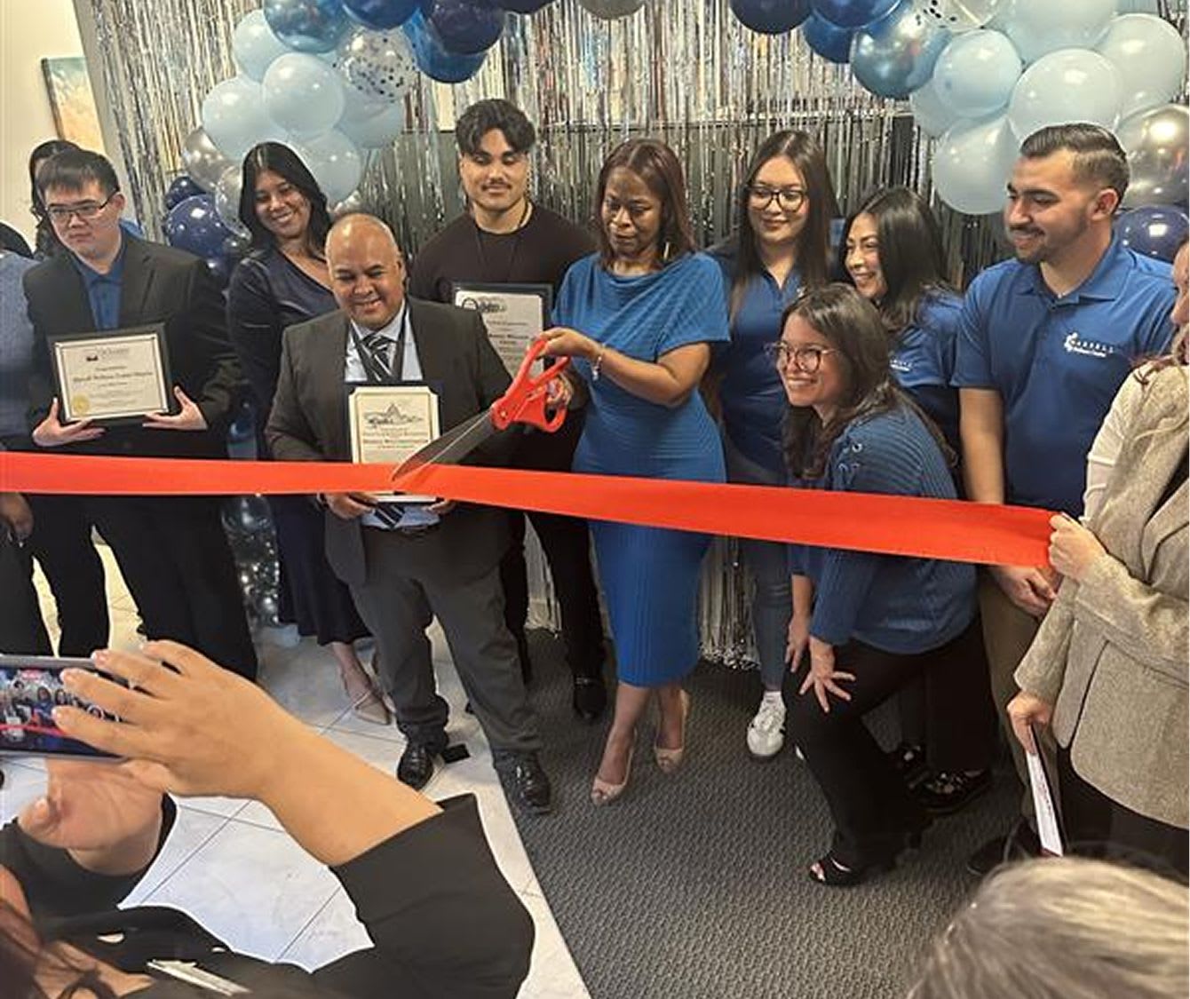 Cutting the ribbon at Marsell Wellness Center