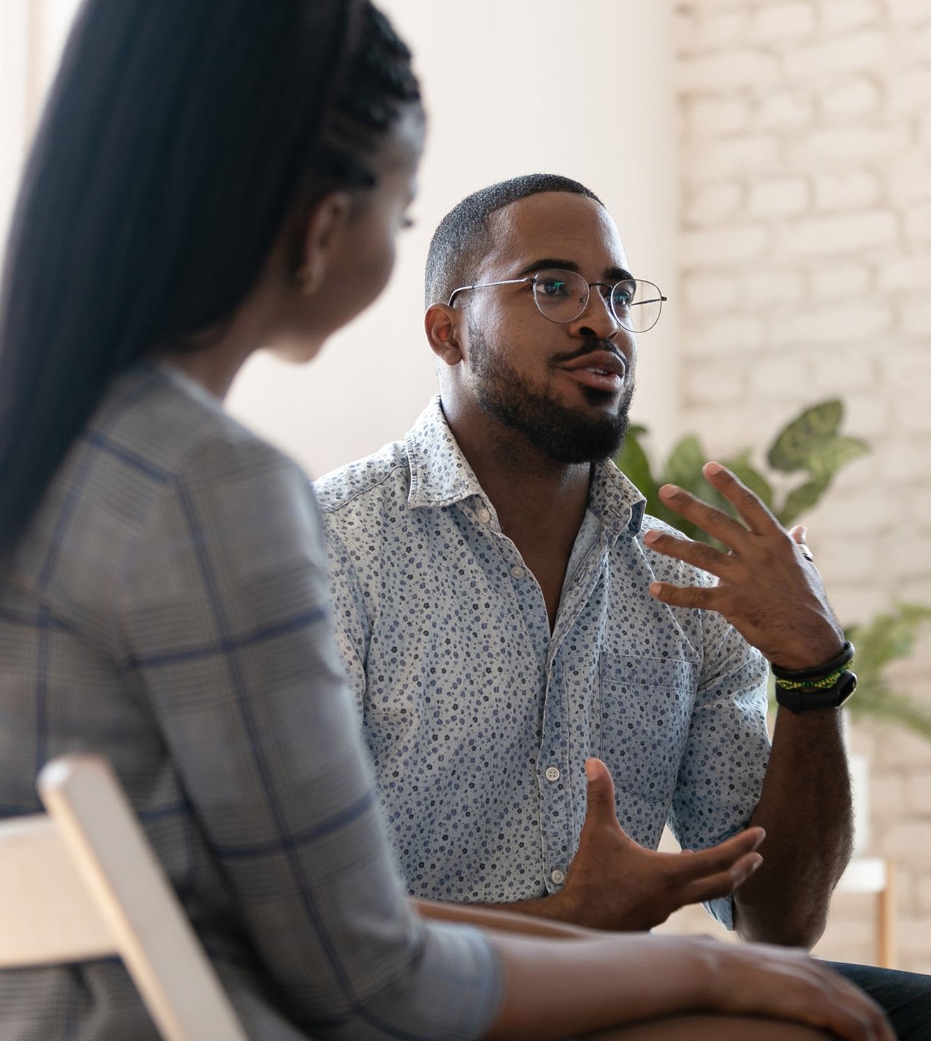 person sharing at group therapy session