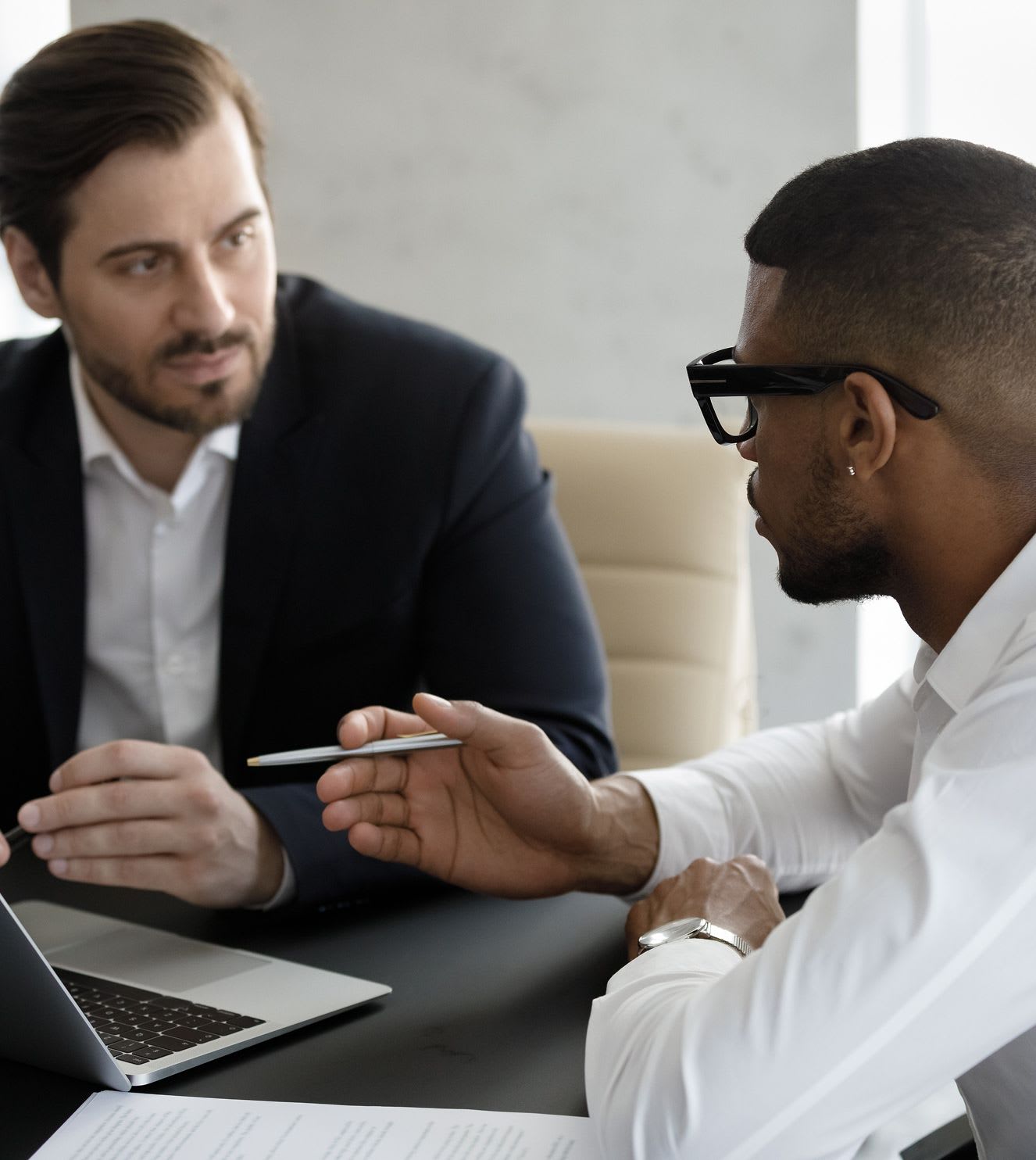 an educational specialist in discussion with a parent