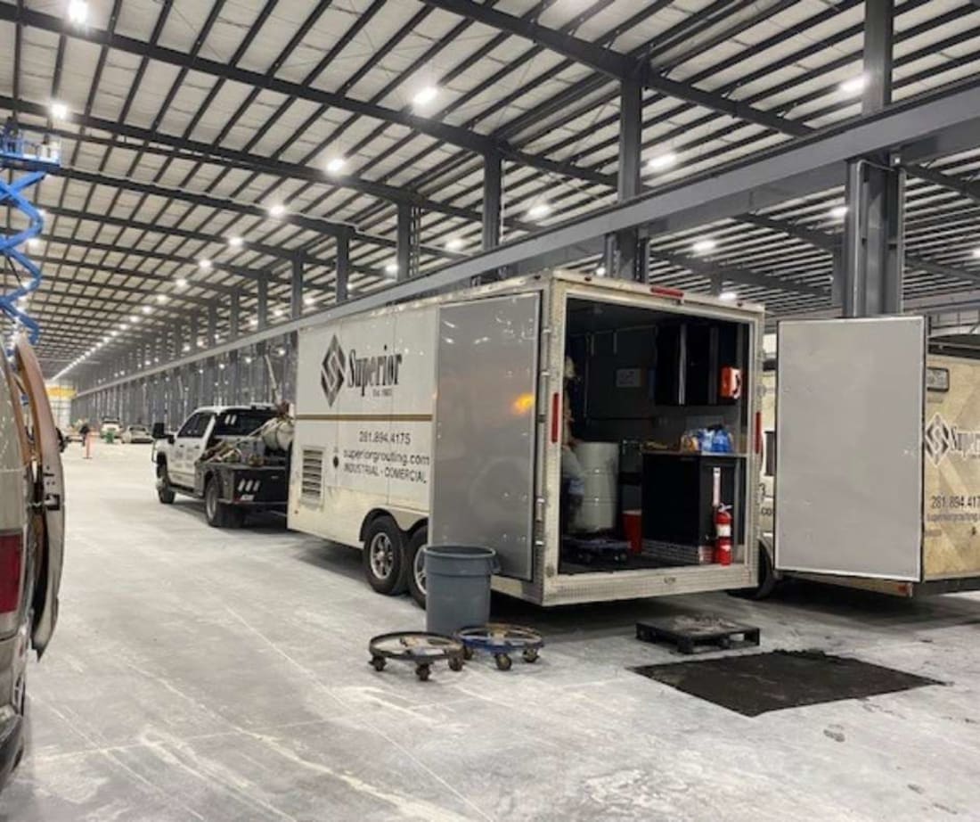 image of superior grouting trailer during crane stabilization with polyurethane injection project