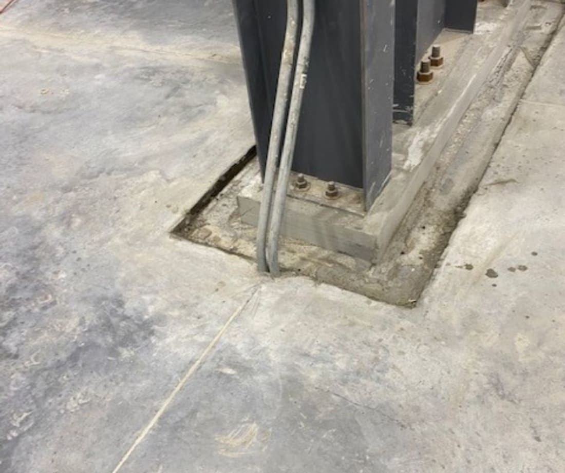 image of sunken beams that held up the crane before crane stabilization from Superior Grouting