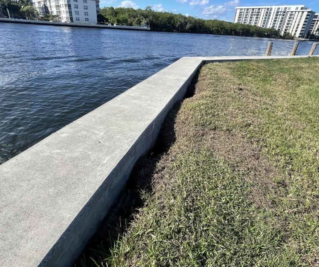 image of seawall experiencing soil loss
