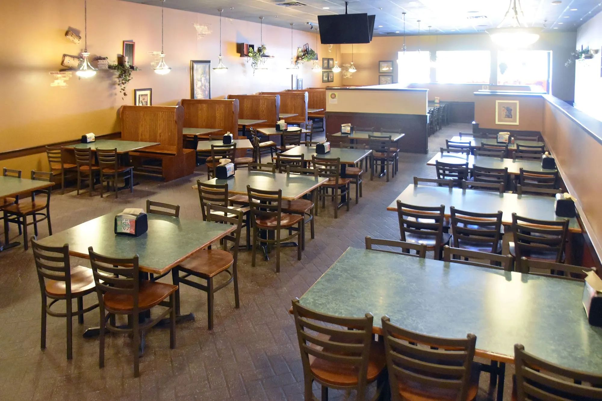 Interior seating at Beggars Pizza in New Lenox