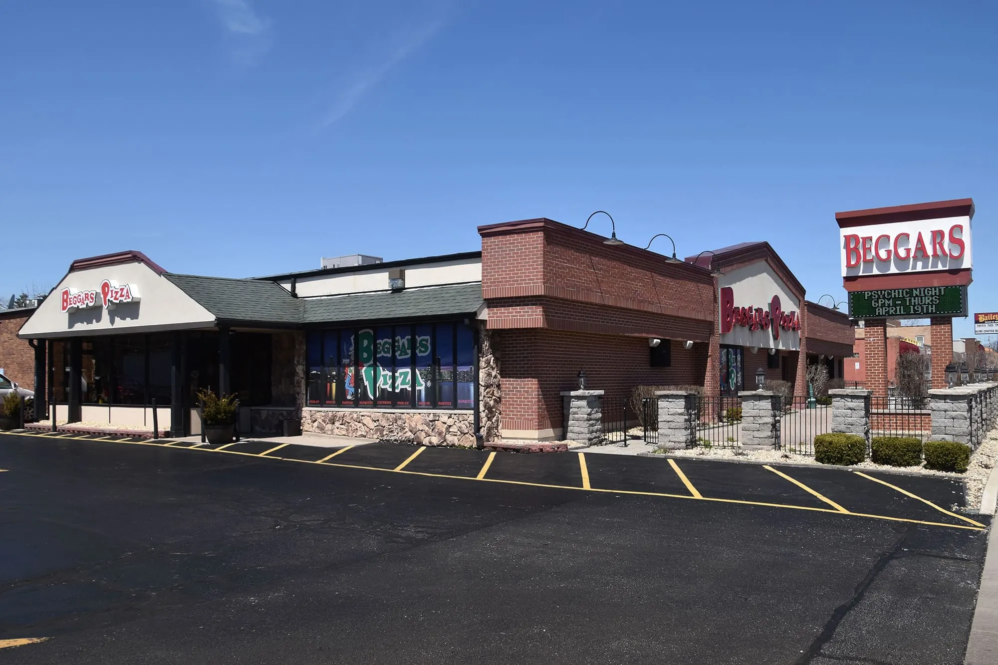More of the exterior of Beggars Pizza in Oak Forest