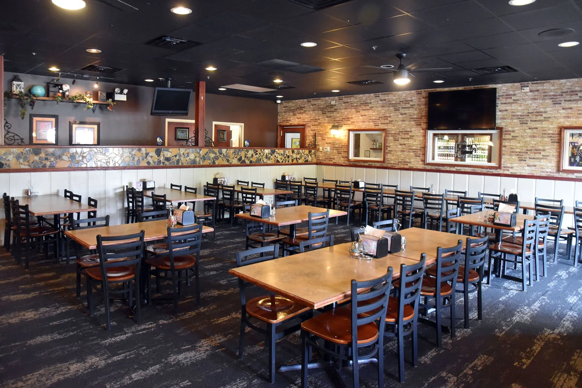 Interior seating at Beggars Pizza in Richton Park