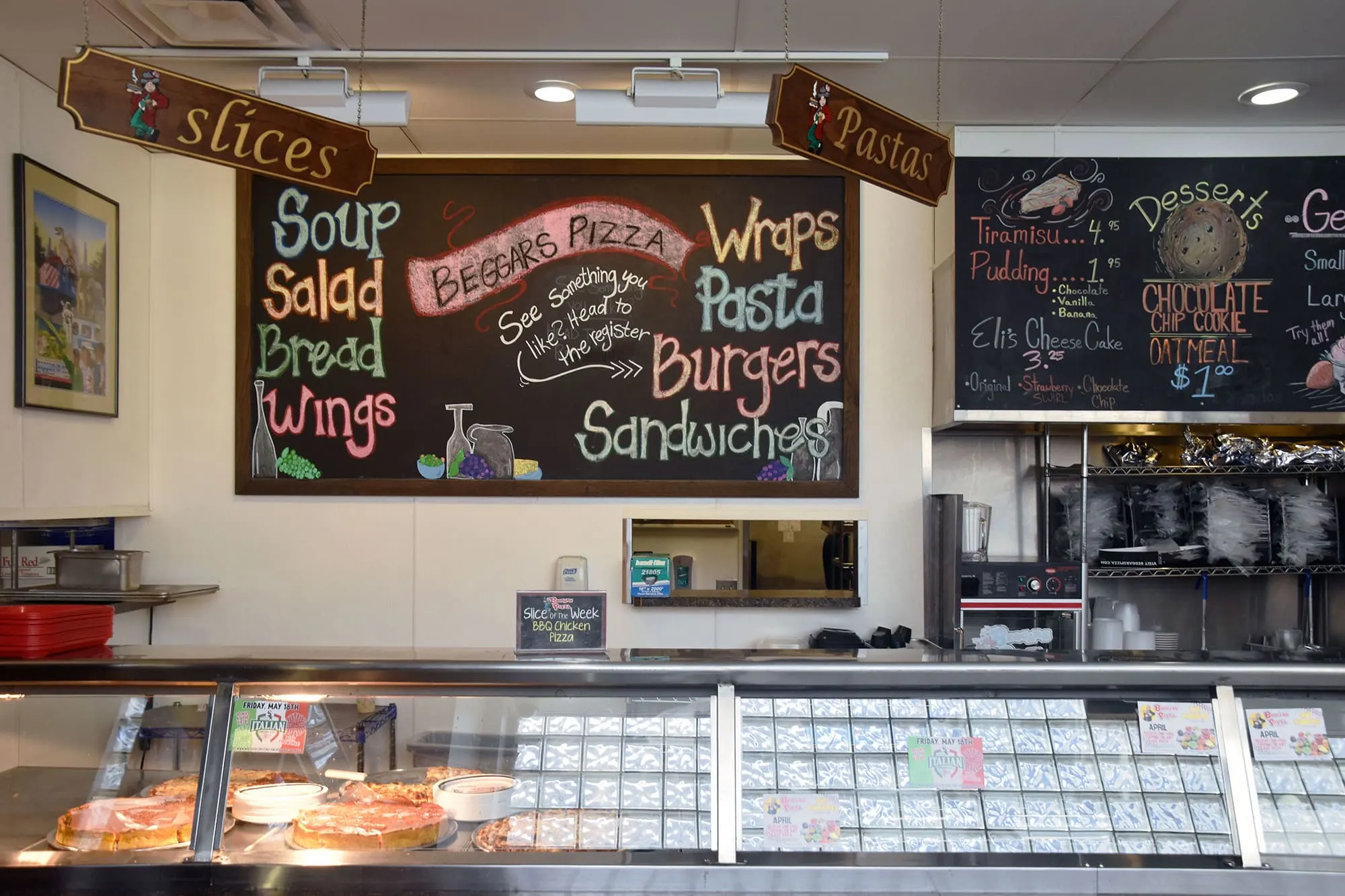The interior counter at Beggars Pizza in Chicago's West Loop