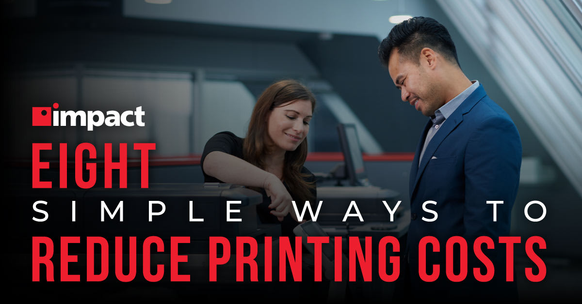 people working at a printer | eight simple ways to reduce printing costs