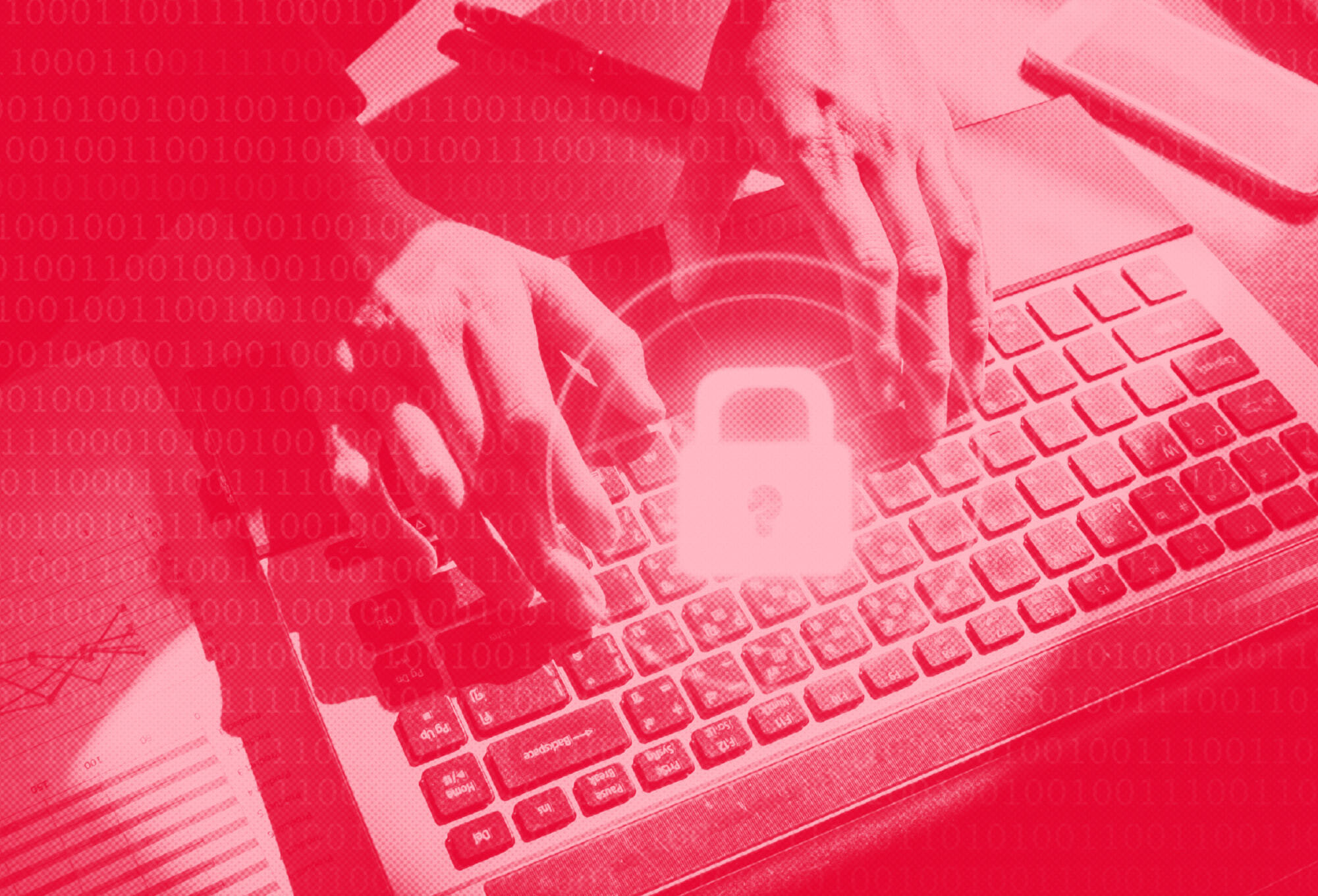 hands typing on computer with lock on top. red coloring