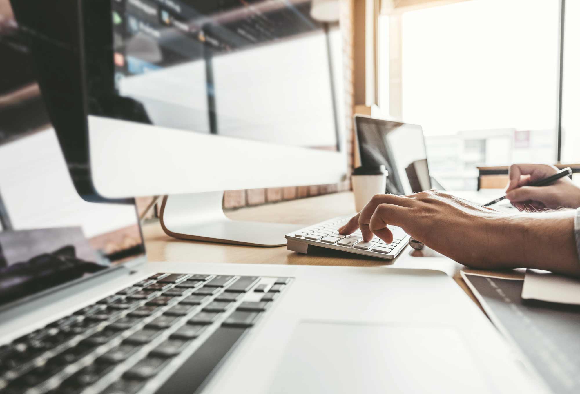 person typing on a computer