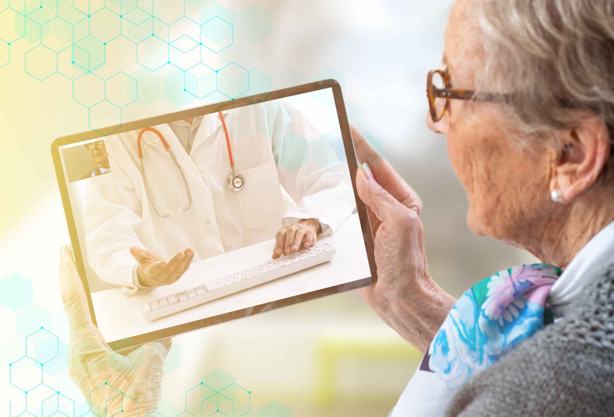elderly lady holding an iPad having a Telehealth appointment