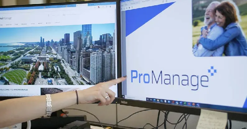person pointing at a laptop screen showcasing promanage's website