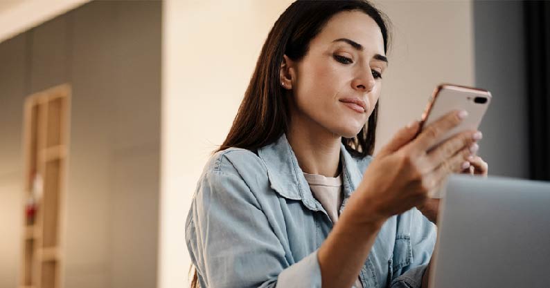 a woman using her phone