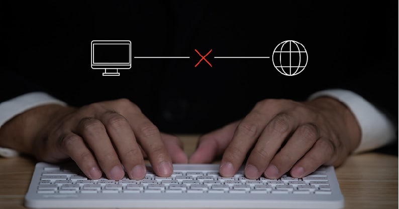 person typing on a laptop