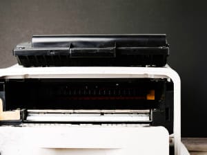 A worn down vintage printer