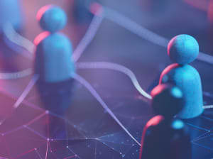 Three little faceless and shapeless figurines on a tabletop