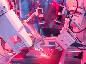 An automated assembly line picturing robots working together to create a product