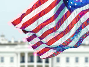 The corner of the American flag with ripples of digitization running through it