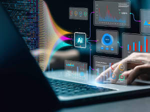 A persons hand on the trackpad of a laptop with a variety of tools connected in a workflow map