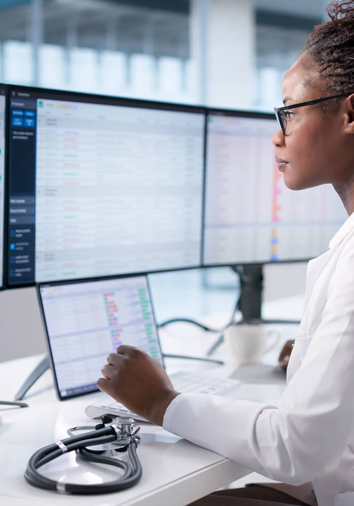 Healthcare worker doing something on the computer