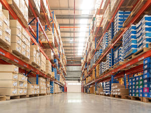 A pair of warehouse wracks full of inventory