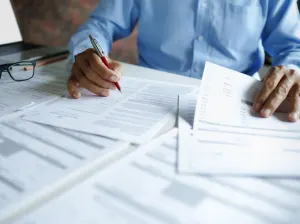 Person signing papers