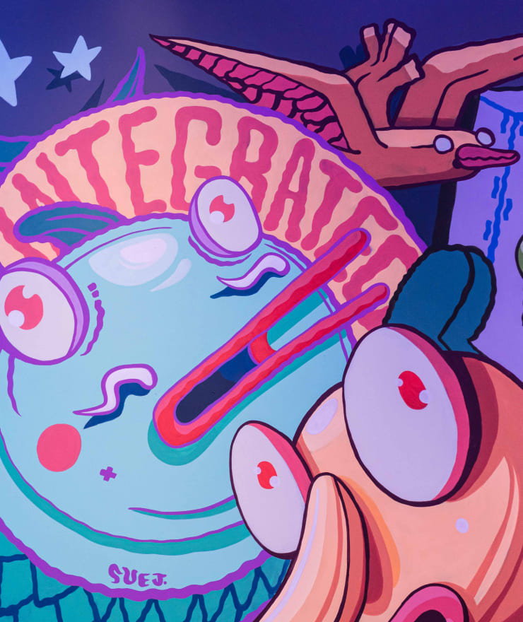 cartoon fish character in colorful mural