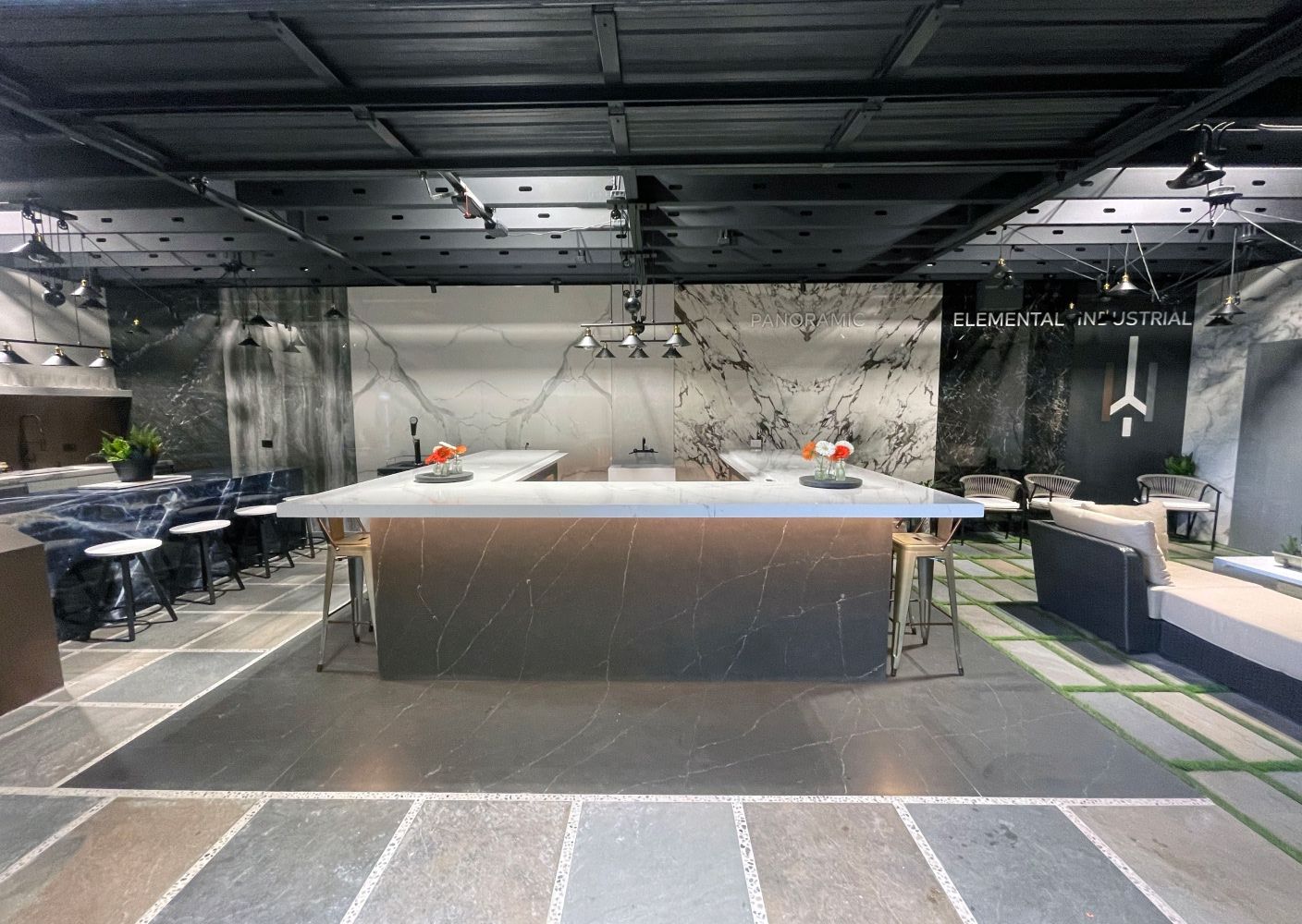 Atlantis Granite & Quartz Showroom with stone countertops, flooring, and walls