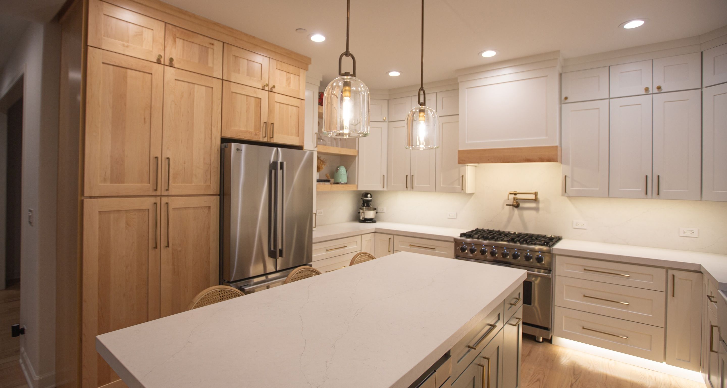 Residential Kitchen with white stone countertops and wooden cabinets