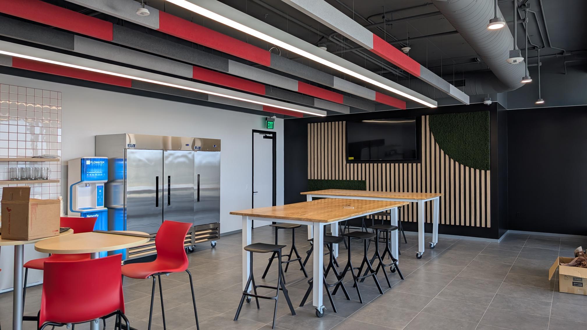 The kitchen with freshly placed furniture in the new Impact Culver City office