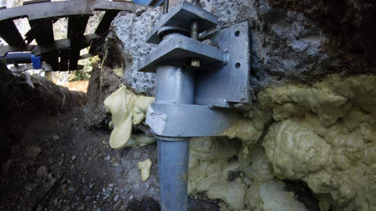 image of foundation pier with polyurethane to help support the building during foundation repair project