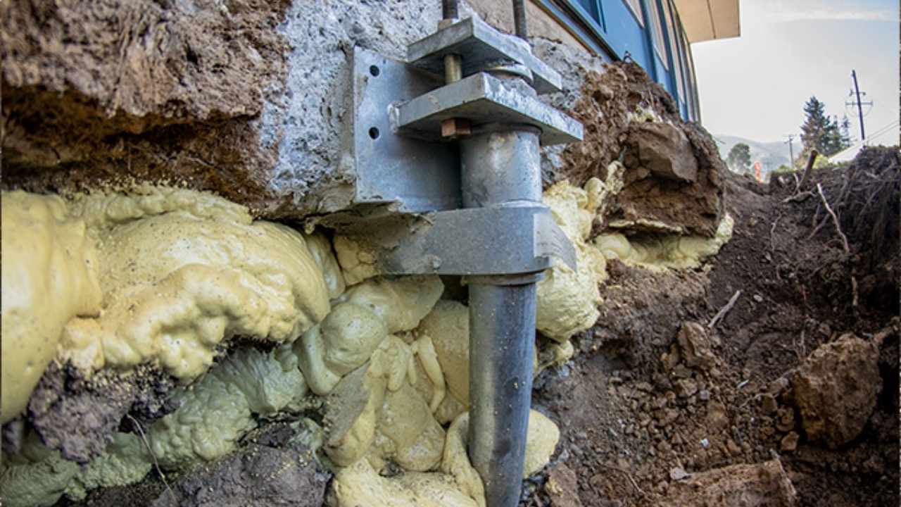 image of foundation pier with polyurethane to help support the building during foundation repair project