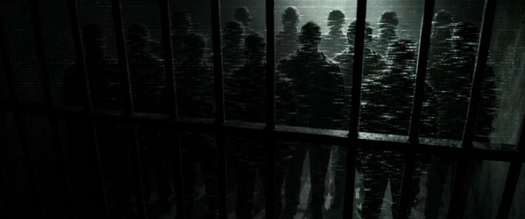 A group of anonymous people behind bars